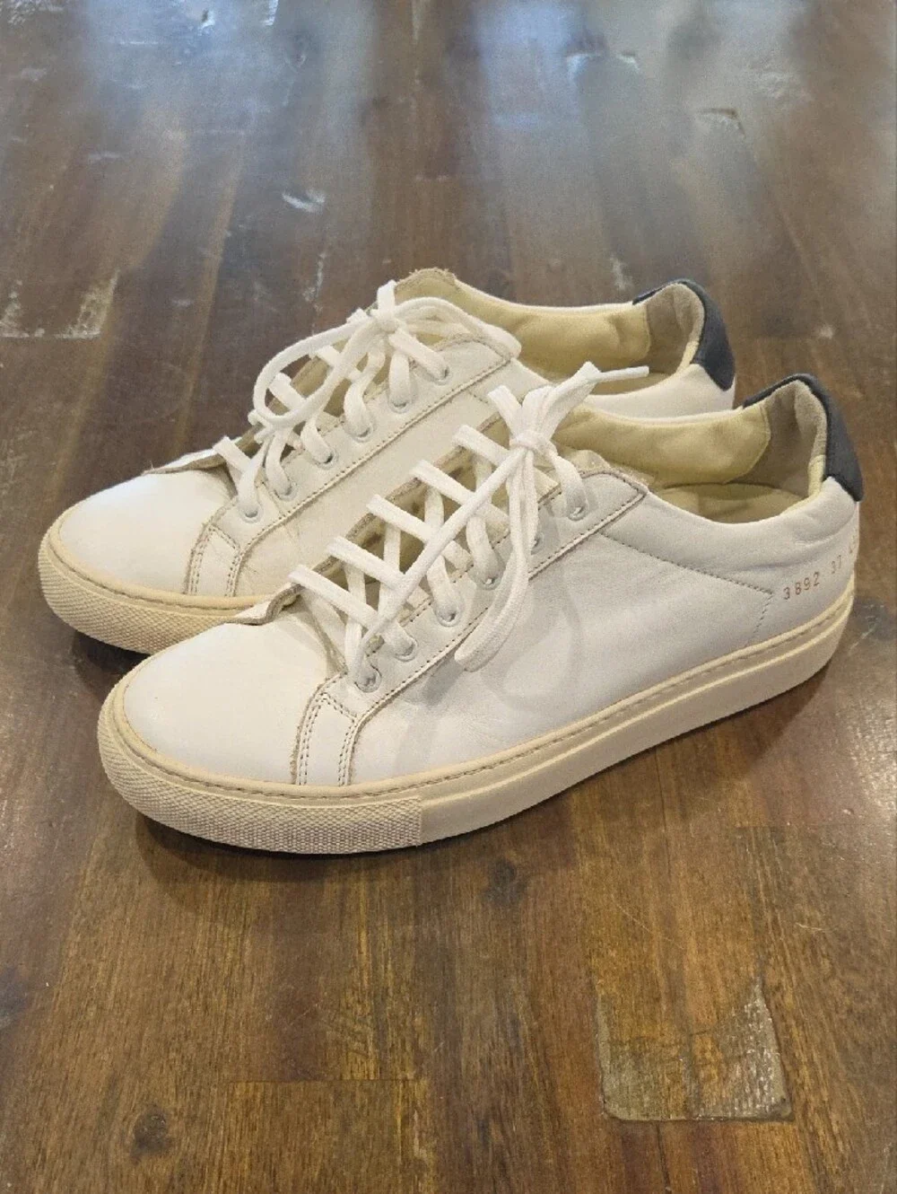 Woman By Common Projects Retro Low White Leather Sneakers with Cream Sole